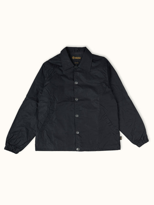 Rompevientos Nashville Wax Coach en Negro, vista frontal — algodón encerado premium. Demons & Machines. #color_negro